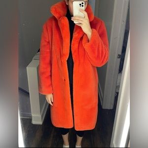 Faux fur orange coat Bershka